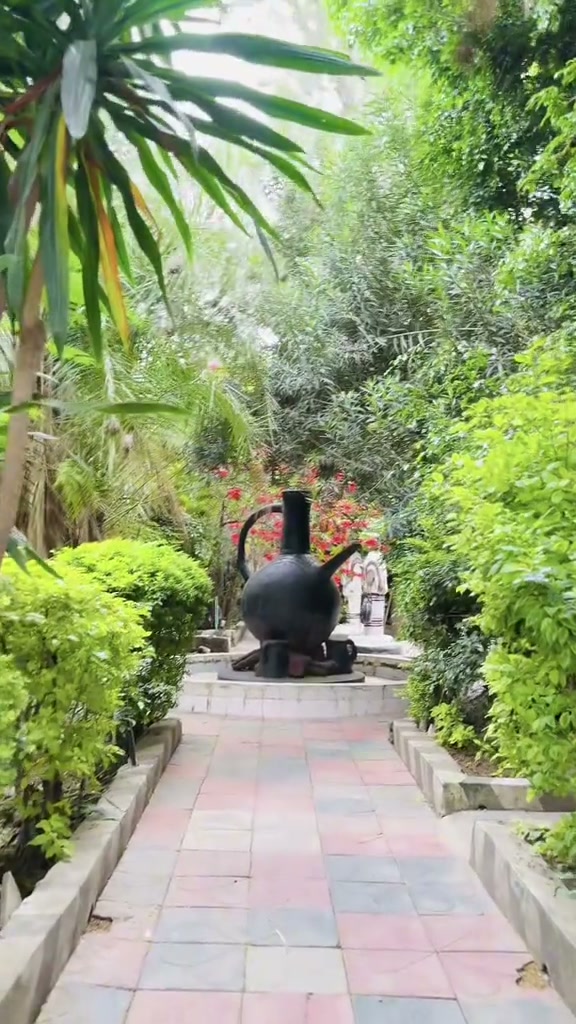 Traditional Ethiopian clay Jebena coffee pot garden monument at Gibe Hotel in Adama